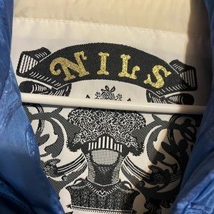 Woman skiing 1 piece suit